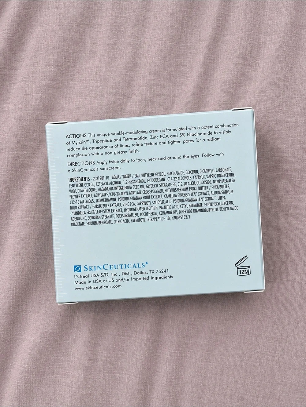 SkinCeuticals P-Tiox Peptide Cream — Light Blue Box on Pink